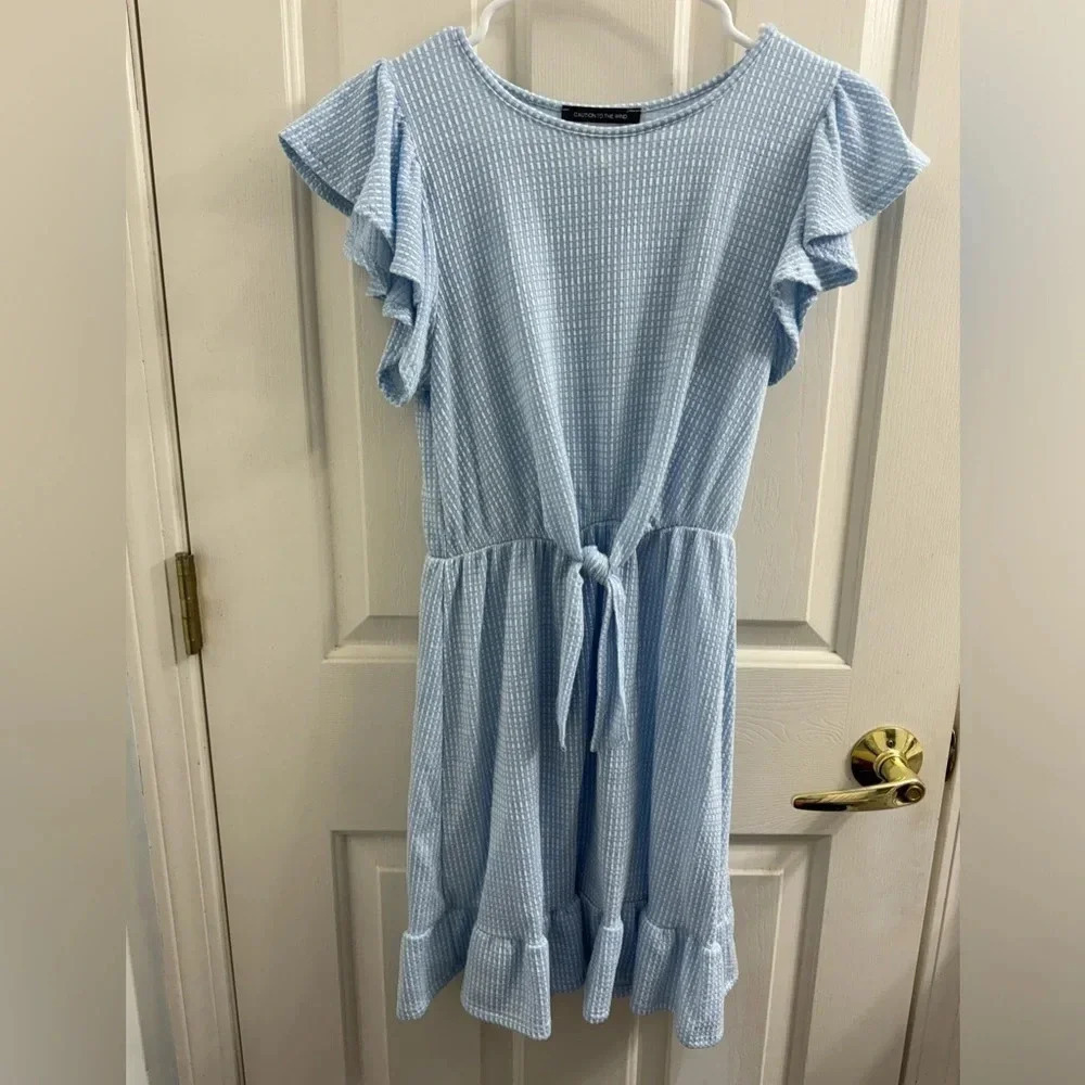 Caution to the wind short flutter sleeve black and white mini dress